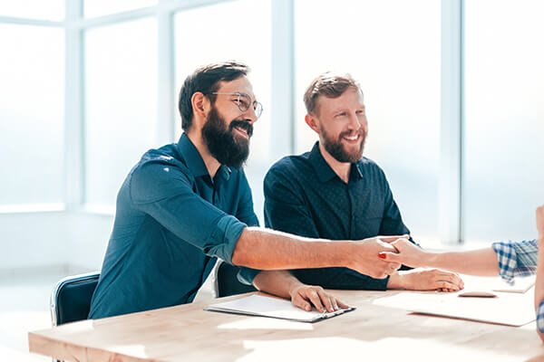 Consultants handshaking